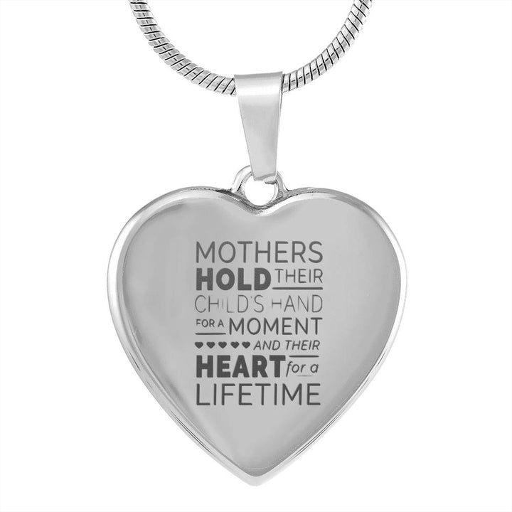 Mother's hold their childs hand - Silver